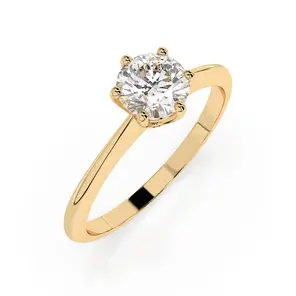 Златен дамски годежен пръстен с диамант 0.25ct на бял фон