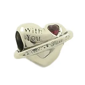 Сребърен талисман сърце с рубинен камък и надпис With you wherever you go