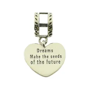 Сребърен талисман за гривна сърце с надпис Dreams make the seeds of the future